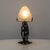 Beautiful French Art Deco table lamp from the 1930s–40s, crafted in black patinated wrought iron with floral and foliate...