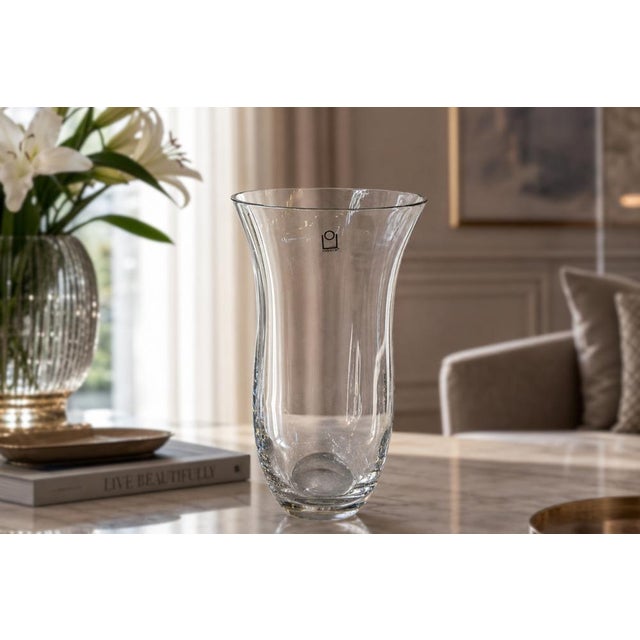 Refined and elegant centerpiece vase in fine clear crystal, produced by the historic Ichendorf glassworks. The piece...
