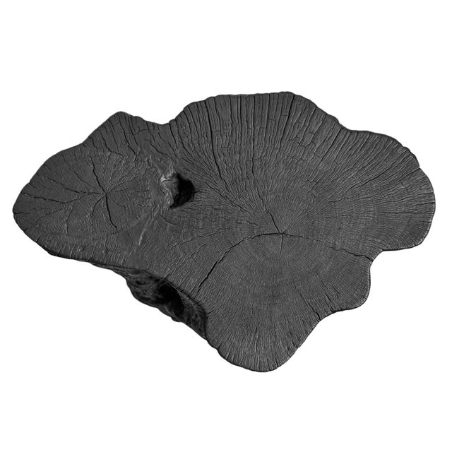 Solid lychee wood stump stool or side table. Attractive modern black finish subtly highlighting the natural wood grain....