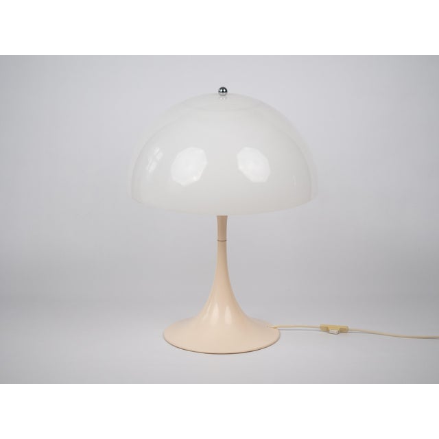 The Panthella desk lamp was designed in 1971 by Verner Panton for Louis Poulsen and is one of the icons of Danish design....