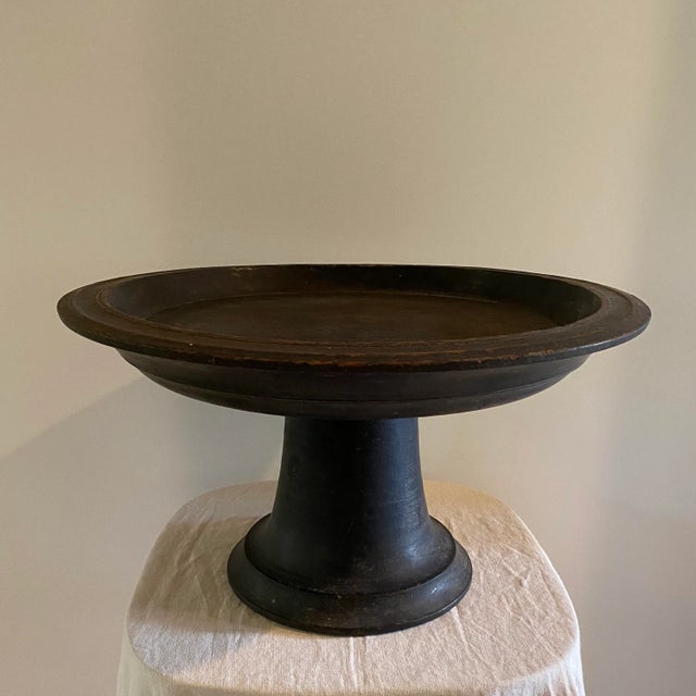 Antique circa 1880-1910 hand-carved/turned wooden raised tray from Indonesia. Made with solid teak wood. Used to offer...