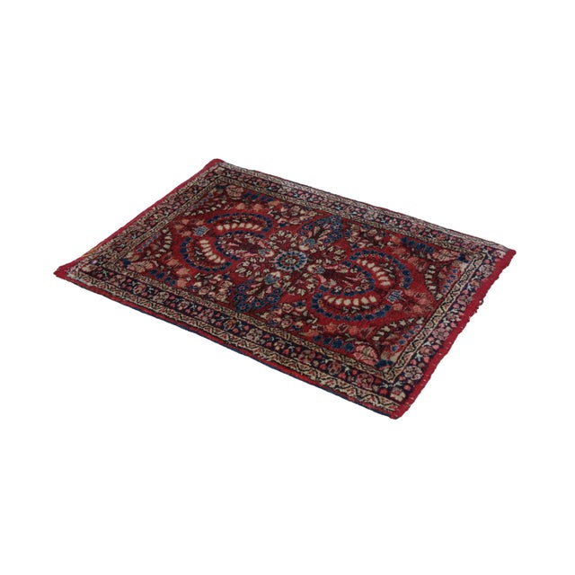 Vintage oriental wool area rug. showcases a classic floral design from the early 20th century. Measuring approximately 2...