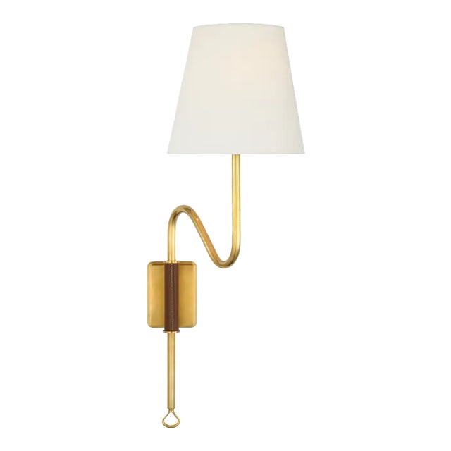 Amber Lewis for Visual Comfort Signature Griffin Articulating Sconce in Hand-Rubbed Antique Brass and Saddle Leather with Linen Shade For Sale