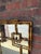 Exceptional vintage LaBarge wall mirror featuring a sculptural faux bamboo frame in a warm antiqued brass finish. This...