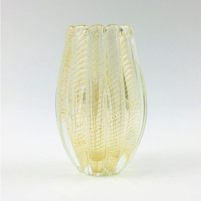 Beautiful and rare Cordonato d'Oro glass vase by Barovier & Toso (Murano, Italy, 1950s). Slightly oval vase with...