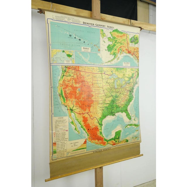 The 1964 Denoyer Geppert Series Mid America roll up map is a significant educational resource, depicting the physical and...