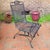 Add timeless charm and comfort to your outdoor space with this high-quality vintage patio rocker arm chair by Woodard....