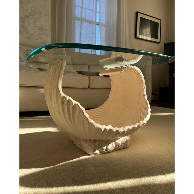 Amazingly unique, hand sculpted and signed, postmodern, plaster shell table with removable glass top. Signed and dated...