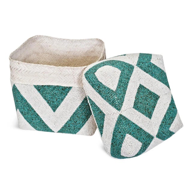 Beautiful hand beaded accessory box made from woven bamboo and intricately covered with geometric triangle patterns. Very...