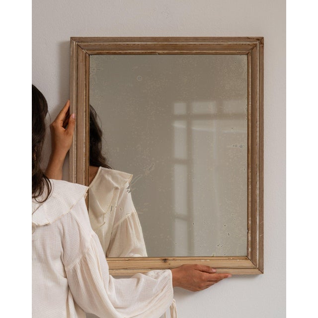 Carved oak window-pane mirror in Weathered Honey Oak. Its weathered honey oak finish sets off mullioned glass panes,...