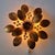 An elegant florentine-style wall or ceiling light by hans kögl from the 1970s. this florentine-style wall light is made of...