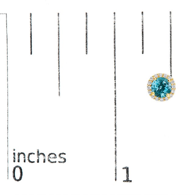 Early 21st Century 10K Yellow Gold Blue Topaz and 1/6 Cttw Diamond Halo Stud Earrings, A Pair For Sale - Image 5 of 5