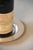 An elegant French silver-plated bottle coaster by Christofle, featuring a classic circular silhouette with a broad, subtly...