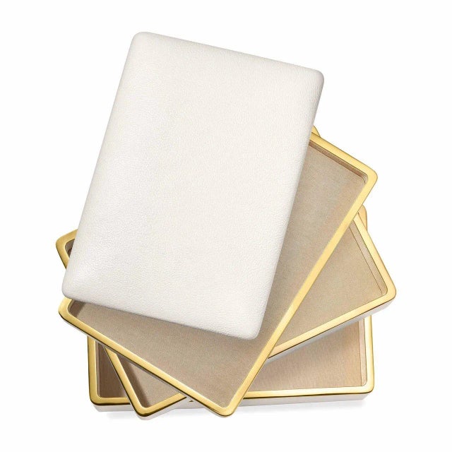 This elegant box in Italian grained leather is a beautiful addition to a vanity holding jewelry in a lidded top tray...