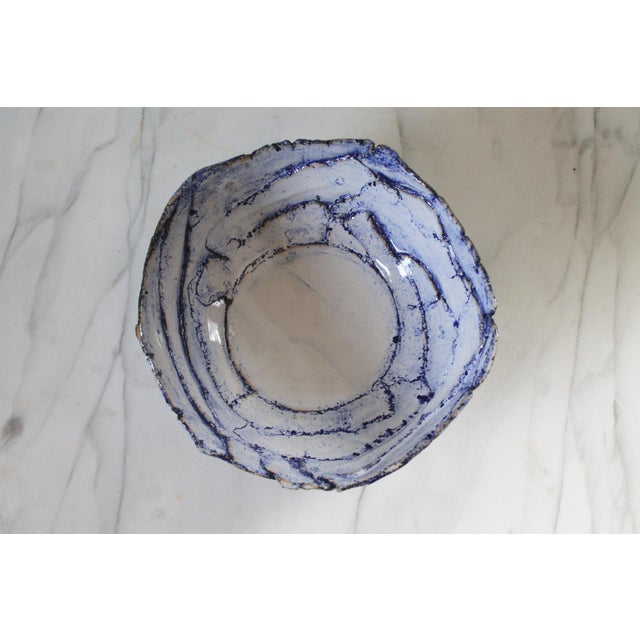 Vintage studio art pottery blue and white glazed decorative bowl. Makers initials on the bottom. Minor age wear. No chips...