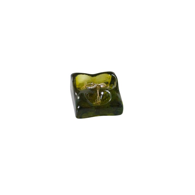 This product is a vintage, french olive/avocado green thick art glass square ashtray or catchall dish. It features a...