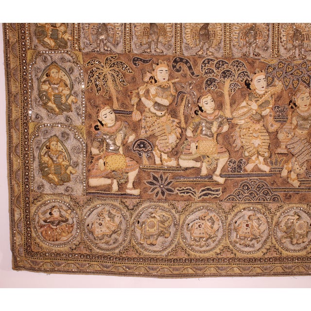 lovely large embroidery from the end of the 19th century representing 8 Thai dancers. We can find on both sides the...