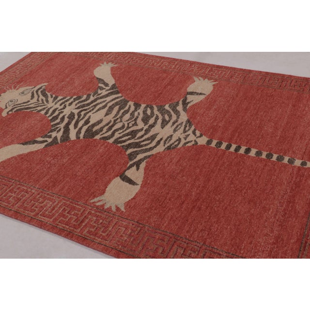 Hand-knotted in wool, this 6x9 rug is a striking new addition to our Distressed Homage collection, inspired by a mid-...