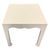 Linen wrapped white side table. Ming legs and side detailing. Lee Jofa for Kravet. Nice and heavy. Never placed in a home.