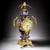 A highly decorative French vase clock executed in cobalt blue porcelain with elaborate gilt bronze mounts, produced in the...