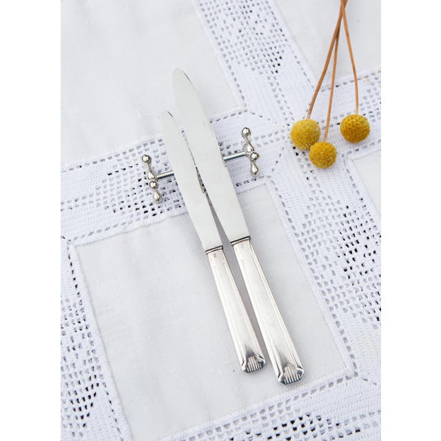 Measurements and weights: 19.5 cm, 24 cm (63.89 grams). Two hallmarks: DAM and the silver plating mark, 18 for the large...