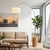Featuring a dramatic blend of suspension and natural materials, the Tambo 92" Arc Lamp is a Mid-Century Modern masterpiece...