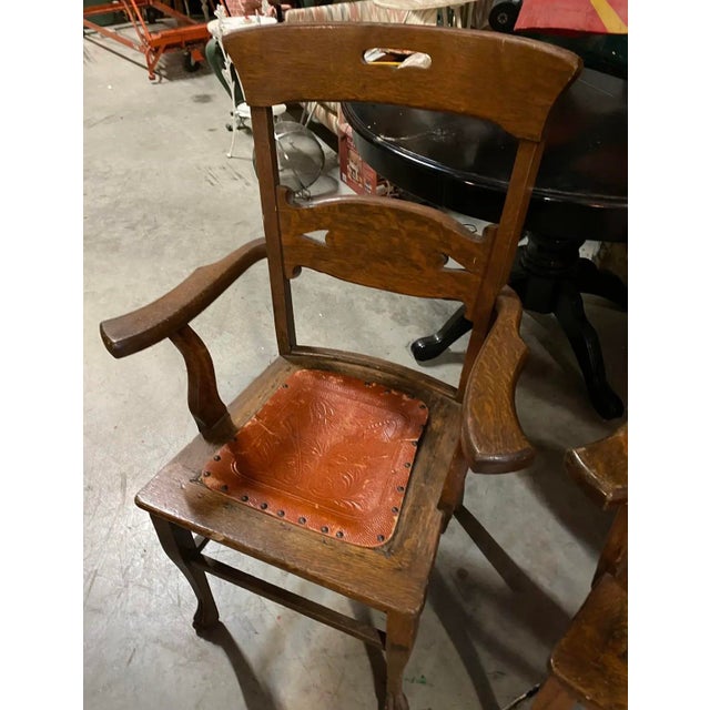 Up for consideration is a beautiful vintage pair of leather seated wooden chairs. These would look lovely in your home,...