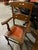 Up for consideration is a beautiful vintage pair of leather seated wooden chairs. These would look lovely in your home,...