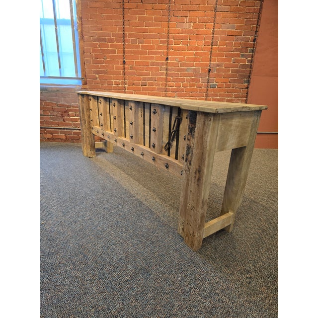 Bring a piece of history into your home with this breathtaking console table. Hand-built from a reclaimed antique...