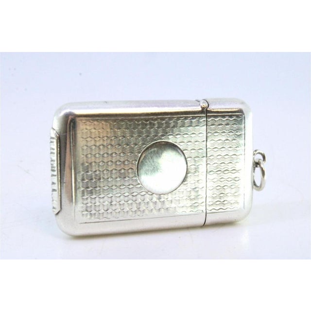 Guilloche Silver Matchbox with Monogram Card and Hanging Ring, in Very Good conditions. Designed before 1890 This piece...