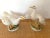 Sweet pair of Italian mid century ceramic geese. Nice large size on a bookshelf. Two different poses. In excellent vintage...