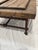 Aged wood coffee table with metal legs. Has old school nails, holes and raised surfaces. Watermarks add to its charm....