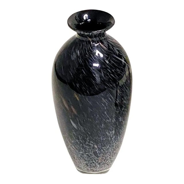 A mid century Murano style black art glass vase with silver and gold. 20th century, Italian hand blown with beautiful high...