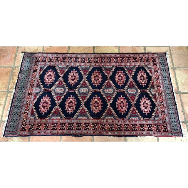 Vintage handmade Persian Hamadan wool rug, circa late 20th century. The primary colors are navy, burgundy and aqua. The...