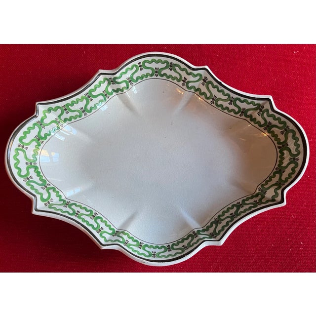 Antique 18th century English George III creamware serving dish, circa 1790. Lobed quatrefoil shape and decorated at the...