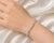 Elegant 18K pink and white 2tone gold flex bracelet featuring brilliant round diamonds totaling 1.2 carats. Estate piece...