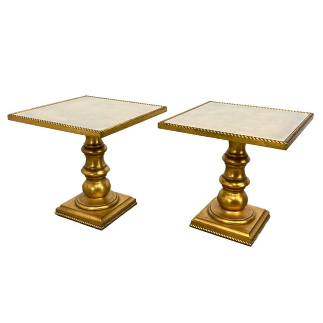 A pair of lacquered and gold leafed neoclassical side tables with braided molding, ca. 1960s.