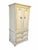 An elegant vintage French Provincial style armoire or linen press featuring a warm cream- painted finish with contrasting...