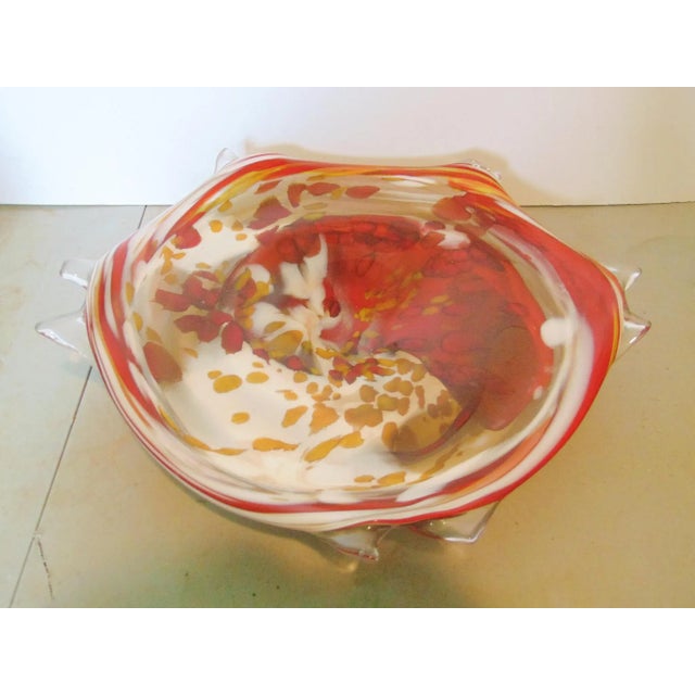 Large Art glass center bowl, end of the day glass design. This type of glass received its name due to the variety of...