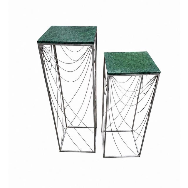 A striking pair of signed Curtis Jere sculptural metal display pedestals, individually dated 1989 and 1990. Constructed of...
