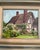 Charming original painting of an English cottage by Texas artist, Jill Pavlas. Framed in a vintage frame.