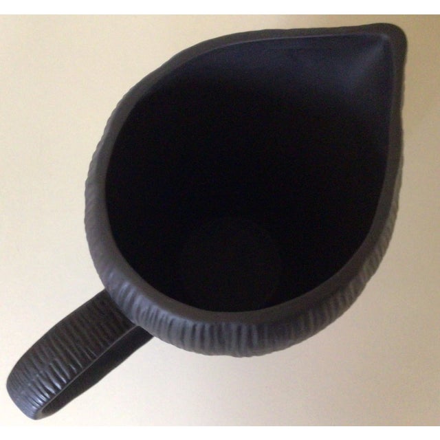 MICHAEL ARAM "Africana Collection" PITCHER Matte black porcelain, 55 Oz. An elegant matte black porcelain pitcher from the...