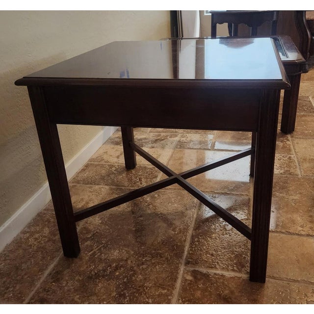 The true anchor of an accent collection, this substantial square end table masterfully pairs traditional Chippendale...