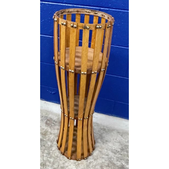 Vintage Mid-Century Modern slatted plant stand with brass bolts. No maker's marks.