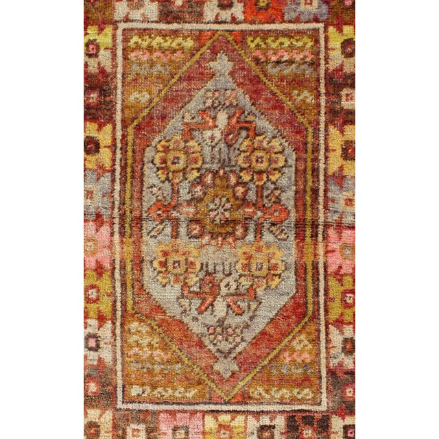 Colorful Vintage Turkish Small Oushak With Floral Medallion and Border For Sale - Image 4 of 7