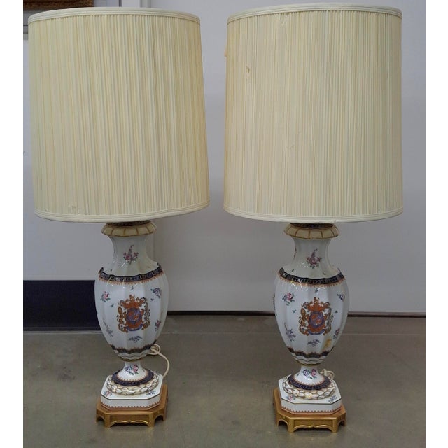 A pair of porcelaine De Paris Bicentennial edition, Vase-shaped, porcelain with hand-painted floral decoration in enamel...