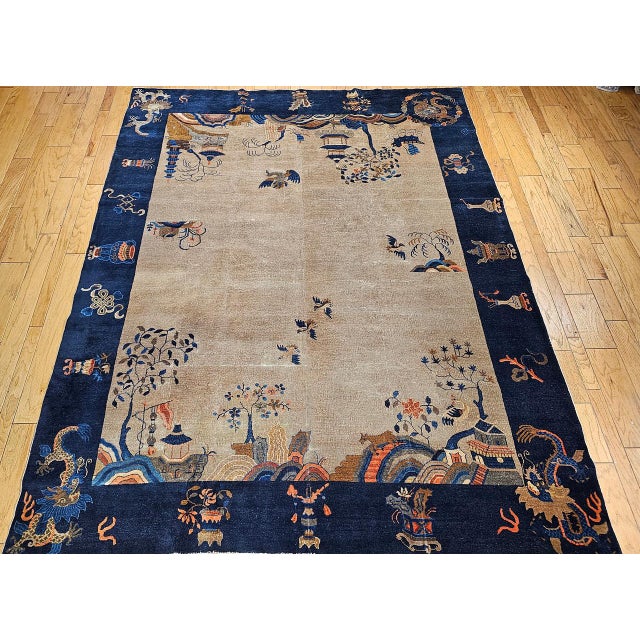 This vintage hand-knotted Chinese Art Deco rug from the early 20th century is a treasure of the genre — a room-size piece...