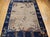 This vintage hand-knotted Chinese Art Deco rug from the early 20th century is a treasure of the genre — a room-size piece...