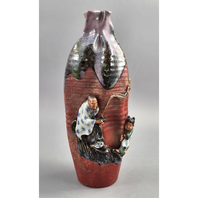 A hand-thrown Japanese Sumida Gawa (Sumida-yaki) vase signed Ban-ni, dating to the Meiji period, circa 1890–1910. The low-...