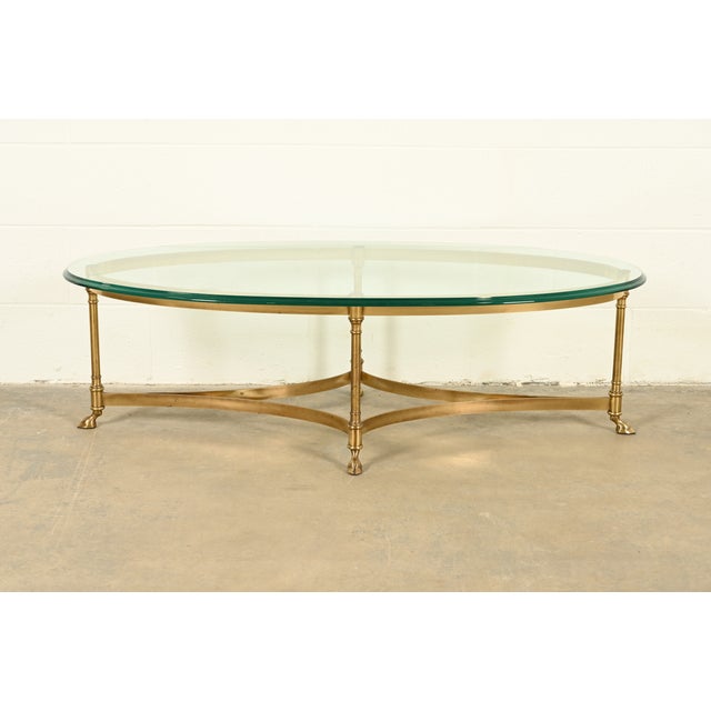 A gorgeous mid-century modern Hollywood Regency hooved feet coffee table or cocktail table By LaBarge USA, Circa 1960s...